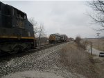 CSX 991 & CSX 5476 moves east while CSX 3207 & ??? heads west